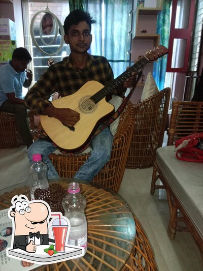 Enjoy a beverage at Adda cafe