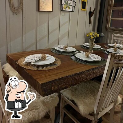 O interior do Restaurante Maria Oliva Bistrô a Casa Amarela em São Luiz do Purunã