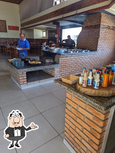 O interior do TAURUS RESTAURANTE
