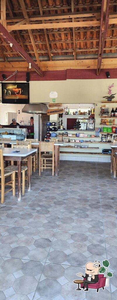 Sente em uma das mesas no Restaurante Fogão a Lenha BR 277