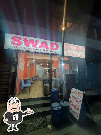 Take a seat at one of the tables at SWAD Sweets & Restaurant (The New Taste Of Ranikhet)
