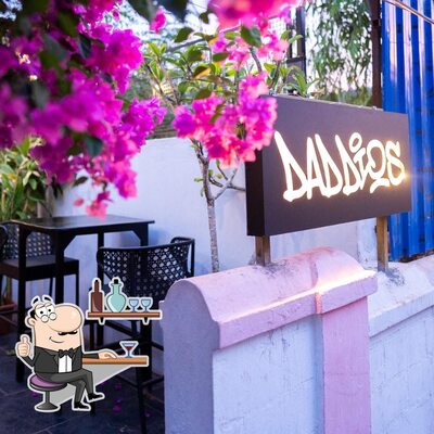 Take a seat at one of the tables at Daddios
