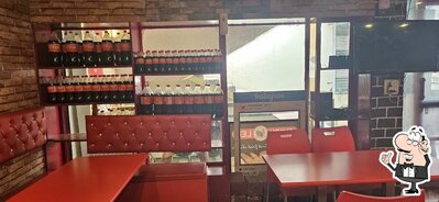 Take a seat at one of the tables at Chickleh