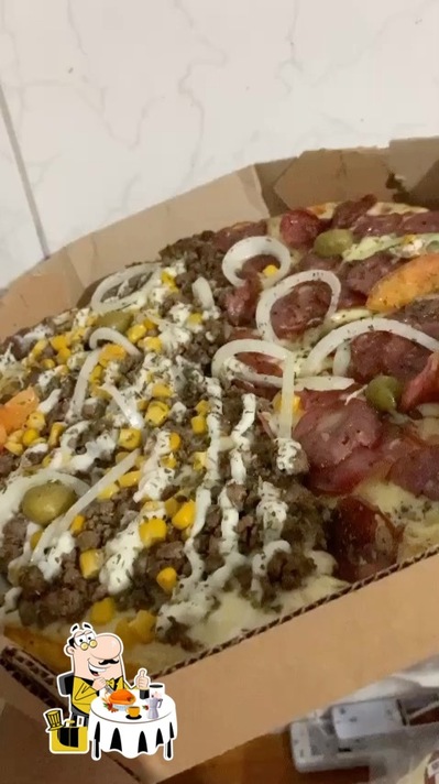 Comida em Pizzaria e Restaurante Caponga