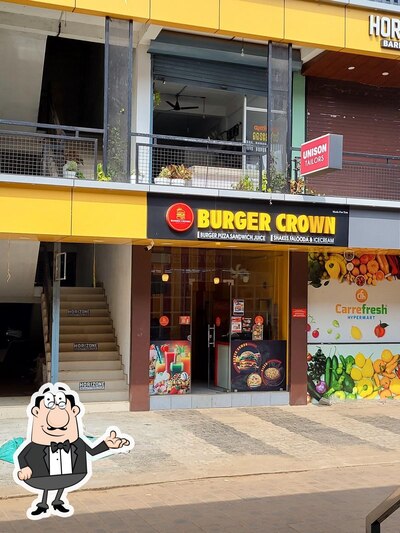 Take a seat at one of the tables at Burger crown