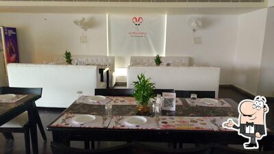 Take a seat at one of the tables at Mutton Mafia