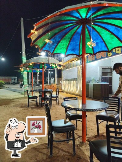 Take a seat at one of the tables at Vivek Dhaba