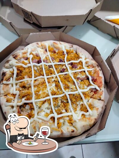 Comida em Pizzaria Bari