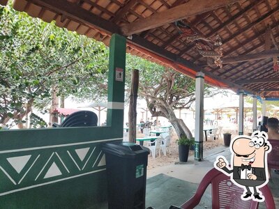 Sente em uma das mesas no Restaurante Samambaia Mosqueiro