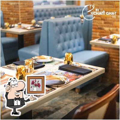Take a seat at one of the tables at Machali Ghar