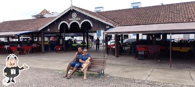 Sente em uma das mesas no Tapiocaria da jane (Box 16)