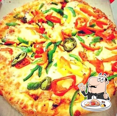 Try out pizza at Pizza Mania Meerut