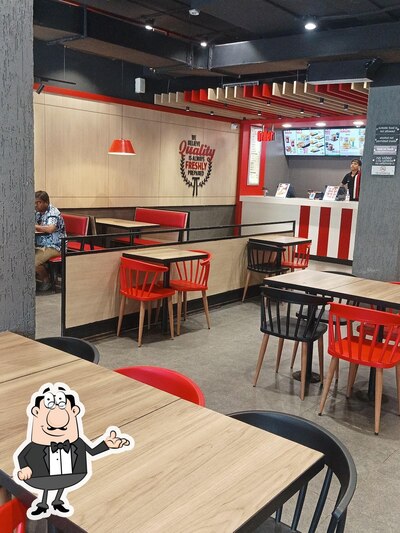 Take a seat at one of the tables at KFC