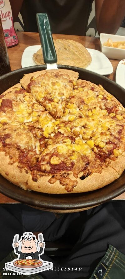 Pick pizza at Pizza Hut Bandi Gowda, Mandya