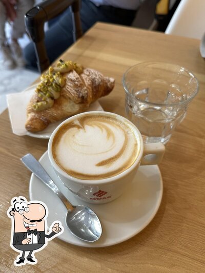 Siediti a un tavolo di Caffè Università