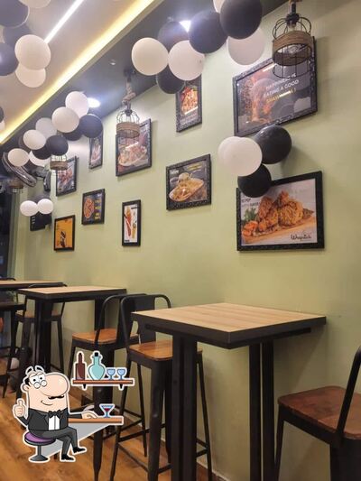 Take a seat at one of the tables at Wrapstick Ayad Udaipur