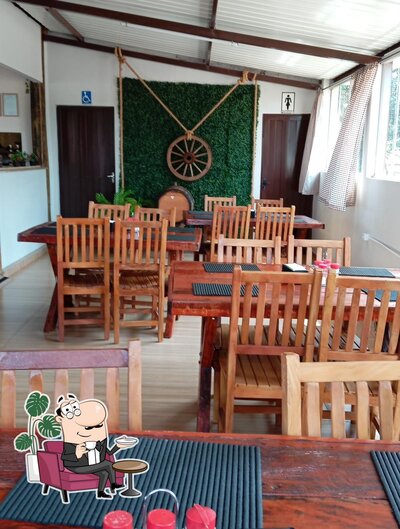 O interior do Restaurante Recanto Ipê Amarelo