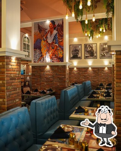 Take a seat at one of the tables at Machali Ghar