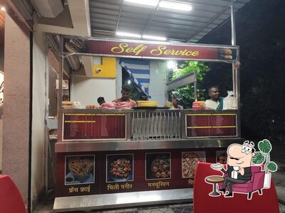 Take a seat at one of the tables at Govinda's pizza