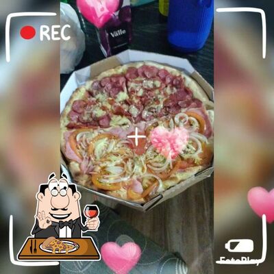 No PIZZARIA VIÇOSA, você pode provar pizza
