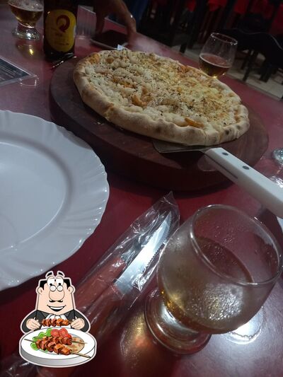 Comida em Pizzaria La-Roça