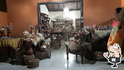 Veja imagens do interior do Sabor e arte pizzaria