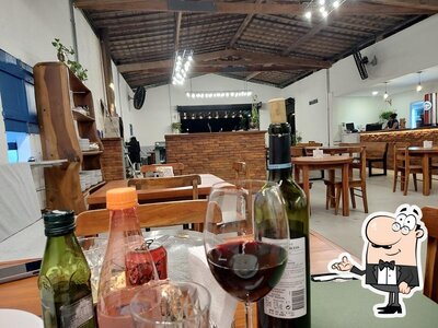 Veja imagens do interior do Pizzaria Canoa
