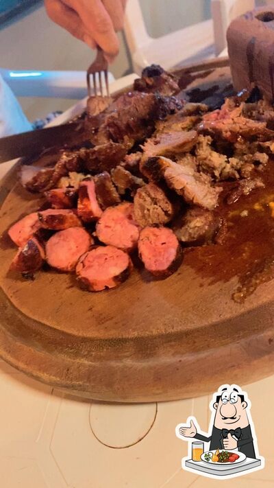 Comida em Churrascaria do Tom