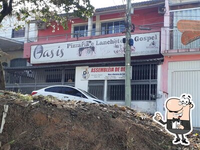 Você pode espairecer no na área externa do Oasis Pizzaria