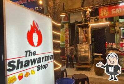 Take a seat at one of the tables at The Shawarma Stop