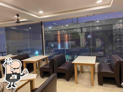 Take a seat at one of the tables at Anantha Ruchulu