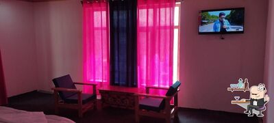 Take a seat at one of the tables at CASTLE CUISINE LADAKH