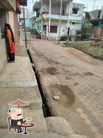 Enjoy the view outside Rajesh Mess House