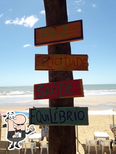 Sente em uma das mesas no Barraca do Marcinho