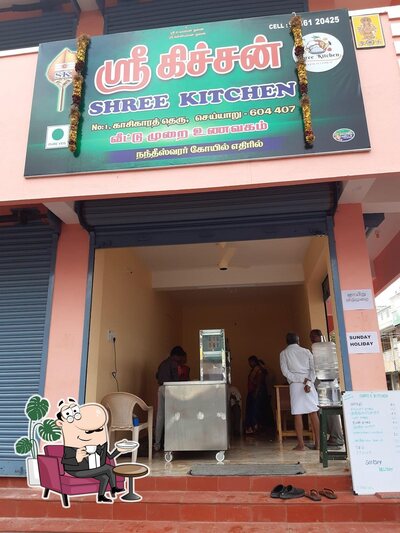 Take a seat at one of the tables at SHREE KITCHEN