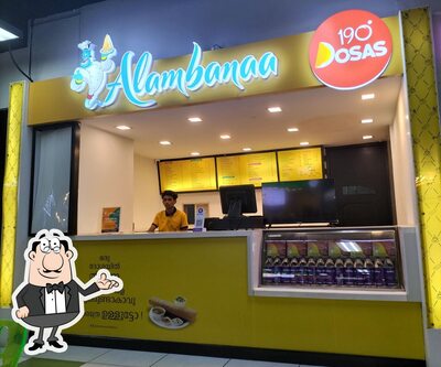 Take a seat at one of the tables at Alambanaa 190 Dosas