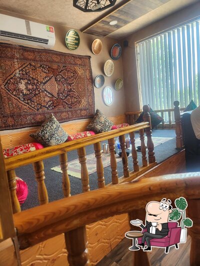 Take a seat at one of the tables at SALAM E WAZWAN