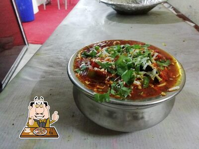 Try out pizza at Balaji Dinning Hall
