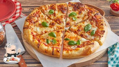 Try out pizza at Night Factory