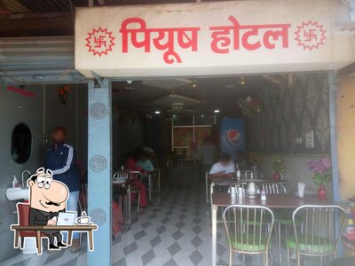 Take a seat at one of the tables at Patna piyush room