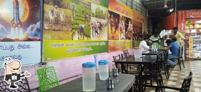 Take a seat at one of the tables at CONTAINER KADAI
