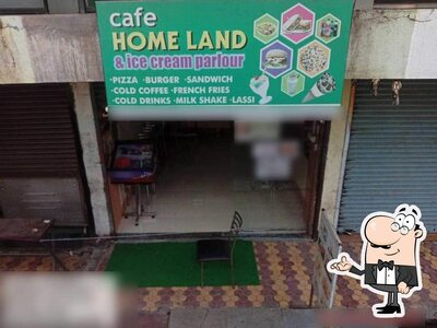 Take a seat at one of the tables at Cafe Homeland