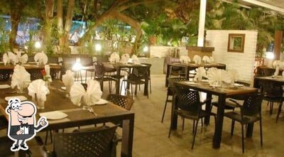 Take a seat at one of the tables at Ghanteshwar Park