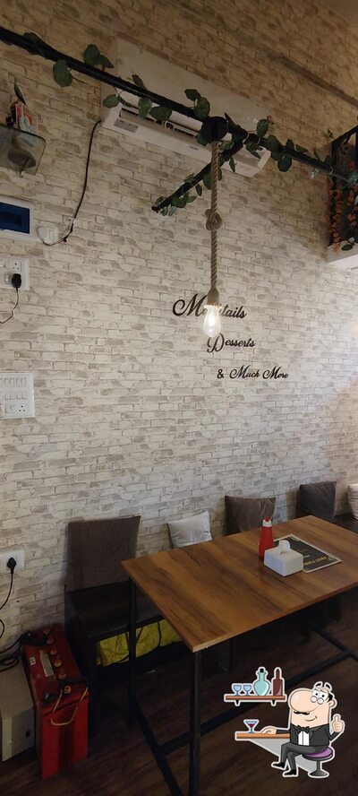 Take a seat at one of the tables at Cafe Fruit Funda