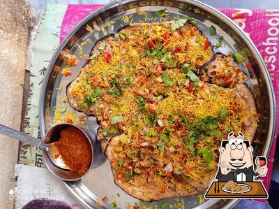 Try out pizza at Balaji Dinning Hall