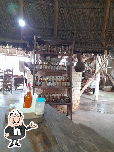 Sente em uma das mesas no Restaurante Pimenta
