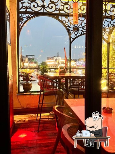 Take a seat at one of the tables at GoodFellas Pub - Bar & Brewery