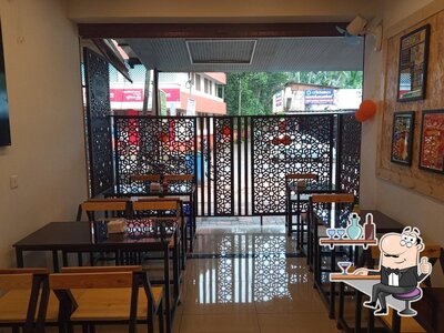 Take a seat at one of the tables at Paris Bakery
