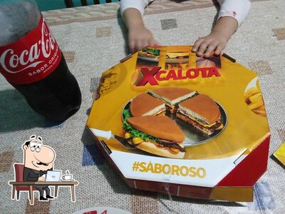 Sente em uma das mesas no X Calota Guarapuava