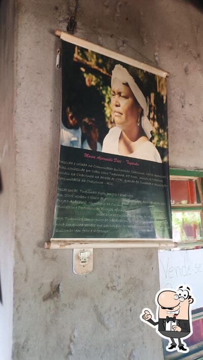 Sente em uma das mesas no Restaurante Sabor do Quilombo